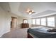 Large main bedroom with a tray ceiling and an en-suite bath with walk-in closet at 10291 Normandy Way, Fishers, IN 46040