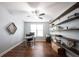 Bright office with wood flooring, rustic shelves and plenty of natural light at 10291 Normandy Way, Fishers, IN 46040