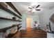 Charming home office with built-in shelving, desk, and comfortable seating at 10291 Normandy Way, Fishers, IN 46040