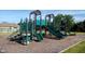 Community playground with slides, climbing structures, and a soft landing surface, providing a safe play area at 10291 Normandy Way, Fishers, IN 46040