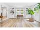 Spacious living room features built-in bookcases and a large window with natural light at 10429 Lasalle Rd, Carmel, IN 46033