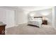 Finished basement bedroom featuring carpet, bed, and dark wood furniture at 1050 Windsor Estates Ct, Westfield, IN 46074