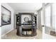 Office space with dark wood furnishing, an art piece, and light hardwood flooring at 1050 Windsor Estates Ct, Westfield, IN 46074