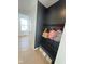 Convenient mudroom area with bench, hooks, and storage baskets for organization at 1050 Windsor Estates Ct, Westfield, IN 46074