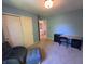 Inviting bedroom with a seating area and a closet space perfect for organization at 11163 Autumn Harvest Dr, Fishers, IN 46038
