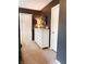 This bedroom features a nine-drawer dresser, neutral carpet, and stylish decor at 11163 Autumn Harvest Dr, Fishers, IN 46038