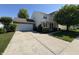 Inviting two-story home with attached garage and long driveway at 11163 Autumn Harvest Dr, Fishers, IN 46038