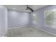 Spacious bedroom with carpet, a ceiling fan, and two windows at 1119 Albemarle Cir, Noblesville, IN 46062