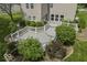 Aesthetic deck surrounded by trimmed bushes and a lush green lawn at 1119 Albemarle Cir, Noblesville, IN 46062