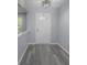 Cozy entryway with gray flooring, a white front door, and a geometric ceiling light at 1119 Albemarle Cir, Noblesville, IN 46062