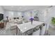Open-concept living and dining area with abundant natural light and neutral decor at 1119 Albemarle Cir, Noblesville, IN 46062