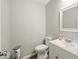 Bathroom features modern fixtures, a new toilet and a sink vanity with storage at 11199 Boston Way, Fishers, IN 46038