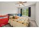 Bedroom with carpet and natural light with colorful decor, perfect for a  at 11199 Boston Way, Fishers, IN 46038