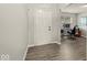 Bright office space with hardwood floors, natural light, and neutral paint at 11199 Boston Way, Fishers, IN 46038