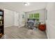 Bright office space with hardwood floors, natural light, and neutral paint at 11199 Boston Way, Fishers, IN 46038