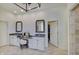 This bathroom features dual sinks with granite counters and a door to the closet at 11508 Willow Ridge Dr, Zionsville, IN 46077