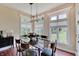 Charming dining room with stylish table, natural light, and elegant furnishings for intimate gatherings at 11508 Willow Ridge Dr, Zionsville, IN 46077