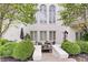 Charming home exterior featuring manicured landscaping, a cozy patio, and elegant architectural details at 11508 Willow Ridge Dr, Zionsville, IN 46077