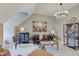 Inviting living room with plush seating, unique lighting, and stylish decor creating a cozy atmosphere at 11508 Willow Ridge Dr, Zionsville, IN 46077