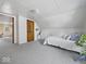 Light and airy bedroom features soft natural lighting and a quaint design at 116 E Railroad St, Fountaintown, IN 46130