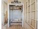 Mud room entry with coat rack, bench, and charming decor at 116 E Railroad St, Fountaintown, IN 46130