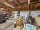 Spacious garage featuring exposed wood beams, ample storage, and room for projects and vehicles at 116 E Railroad St, Fountaintown, IN 46130