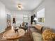 Cozy living room with neutral tones, lots of natural light and comfortable seating at 116 E Railroad St, Fountaintown, IN 46130