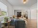 Open-concept living room with lots of natural light and warm, neutral color palette at 116 E Railroad St, Fountaintown, IN 46130