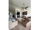 Spacious living room with TV, furniture, carpeted floors, and natural light at 1287 Northcraft Ct, Franklin, IN 46131