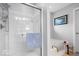 Modern bathroom showcasing a glass-enclosed shower and a soaking tub at 13410 Mancroft Dr, Fishers, IN 46037