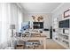 Spacious home office with dual monitors, a large desk, and ample shelving at 13410 Mancroft Dr, Fishers, IN 46037