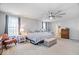 Relaxing main bedroom with a large bed, a ceiling fan, and a warm color palette at 13410 Mancroft Dr, Fishers, IN 46037