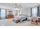 Spacious main bedroom with a large bed, lots of natural light, and carpet flooring at 13410 Mancroft Dr, Fishers, IN 46037