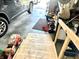 This garage has a wooden ramp, air compressor, and a Traverse parked inside at 135 Crestwood Ave, Crawfordsville, IN 47933