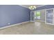 Bright dining room featuring tile floors, white trim and a chandelier at 13909 Springmill Rd, Carmel, IN 46032