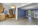 Spacious kitchen seamlessly connects to the dining room, featuring ample counter space and cabinetry at 13909 Springmill Rd, Carmel, IN 46032