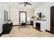 Well lit office with modern furniture, a fireplace, and light wood floors at 1402 Olive St, Indianapolis, IN 46203