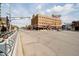 An expansive street view features a classic brick building with street-side retail in a lively downtown area at 1402 Olive St, Indianapolis, IN 46203