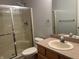 Bathroom with a shower, toilet, sink, and a towel rack at 1604 Stonewall Dr, Greenfield, IN 46140