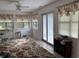 Bright living room with tiled floors and large windows at 1604 Stonewall Dr, Greenfield, IN 46140