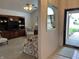 Open-concept living room features a built-in entertainment center and lots of natural light at 1604 Stonewall Dr, Greenfield, IN 46140
