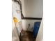Utilities area with water heater, pressure tank, and plumbing, neatly arranged and easily accessible at 1605 S Whittier Pl, Indianapolis, IN 46203