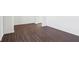 Large bedroom with dark hardwood flooring at 1614 N Clearwater Dr, Greenfield, IN 46140
