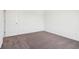 Comfortable bedroom featuring neutral carpet and clean white walls at 1614 N Clearwater Dr, Greenfield, IN 46140