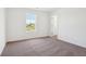 Bedroom with a window offering natural light and scenic views at 1614 N Clearwater Dr, Greenfield, IN 46140