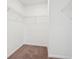 Walk-in closet with wire shelving and neutral carpet at 1614 N Clearwater Dr, Greenfield, IN 46140