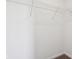 Walk-in closet with metal shelving, white walls, and neutral carpeting at 1614 N Clearwater Dr, Greenfield, IN 46140