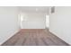 Spacious hallway with neutral carpet and white walls at 1614 N Clearwater Dr, Greenfield, IN 46140