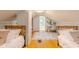 Charming bedroom featuring a sleeping area, desk space, and open shower at 1709 E Loretta Dr, Indianapolis, IN 46227