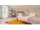 Charming bedroom featuring a sleeping area, desk space, and open shower at 1709 E Loretta Dr, Indianapolis, IN 46227